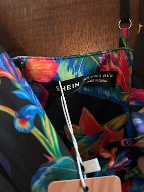 SHEIN Black Floral Spaghetti Strap Dress with Bright Blooms